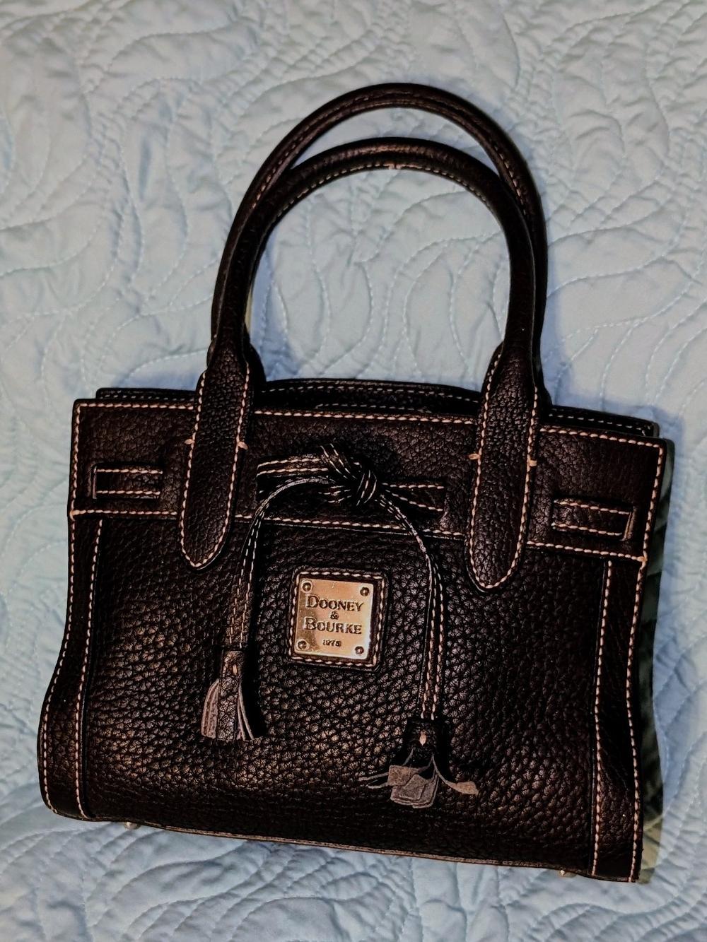 Dooney & Bourke Black Pebbled Leather Satchel with Tassel Detail